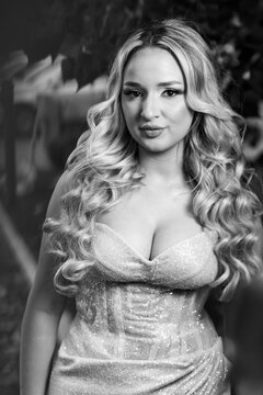 Blonde Teen in Silver Prom Dress, Black and White Portrait, Urban Background