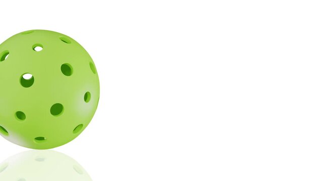 Animated bright green pickleball ball spinning gently from left to the right screen with shadow and reflection effect isolated on white background