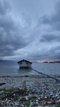 Dramatic Clouds Timelapse Over Lake Bafa With Fishing Boats. High quality 4k footage