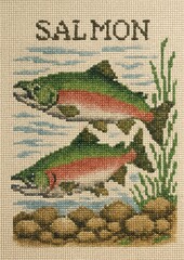 Fototapeta premium Colorful salmon cross-stitch art.