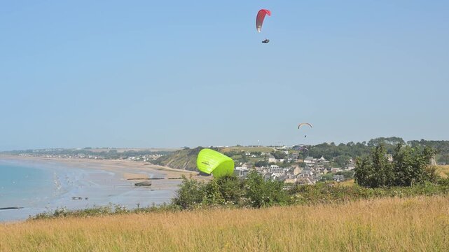 Paragliders Laid Out on the Cliffs of Arromanches
