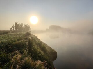 Morning fog over the river, summer landscape.