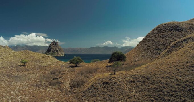 Cinematic Drone Shot of Padar Island Landscape Under. Clear Blue Sky