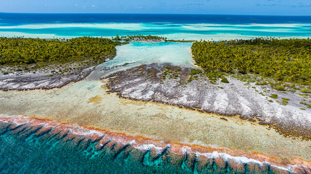 Aerial view of blue lagoon and reef in Fakarava, French Polynesia