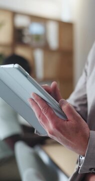 Scroll, review or hands in office with tablet, draft edit or source feedback for article update. Browse, man or journalist in newsroom with tech, blog fact check or industry research for publication.