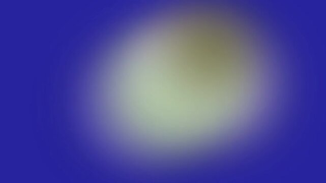 Blurred yellow and green oval shape on a deep blue background.