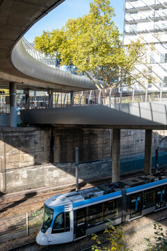 Architecture over tram station and tracks in La Defense Paris business district showing modern urban transit and contemporary infrastructure