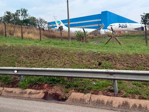 Azul airplanes parked at ⁨Campinas⁩ Viracopos Airport on a spring day. Photo taken October 11th, 2025, ⁨Campinas⁩, Viracopos, Brazil.