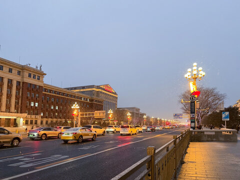 Beijing, China - January 17, 2026: East Chang An Avenue. Evening traffic on Beijing's streets, filled with cars and illuminated buildings.