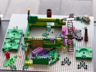 Naklejka premium Colorful toy brick playset on baseplate