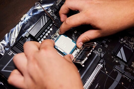 Krasnodar, Russia: August 17, 2025: Gigabyte motherboard. Installing an Intel Core i5 processor. Assembling a desktop PC