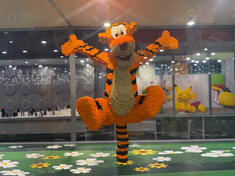 Lego tigger mid-jump