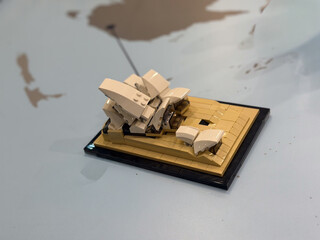 Naklejka premium Beige microbuild architectural sculpture on display