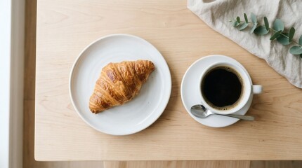 Croissant and Coffee Minimalist Morning on Wooden Table.