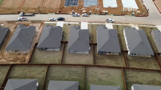 New construction homes along Arabian Ln near Highpointe Ranch sit beside FM 1385 and Liberty Rd in north Aubrey. Fresh sod, clean fencing lines, rooftops and yards recent completed houses, Texas