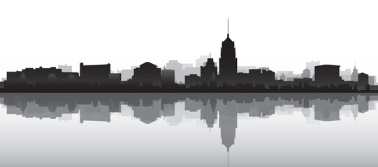 Obraz premium Black and white panoramic poster of the city skyline with misty background buildings and water reflection of SAN ANTONIO, UNITED STATES