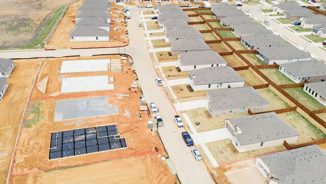Construction staging pads, foundation work Highpointe, US-377, Blackjack Rd, trenching, plumbing lines, moisture barriers lots. Rebar grids, dark sheeting, graded soil, early build, Aubrey, TX
