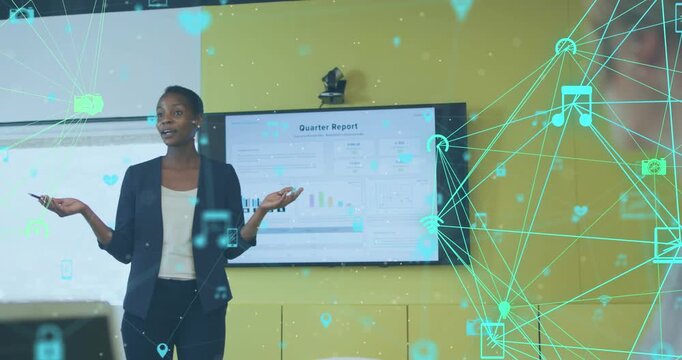 Animation of connected icons over african american businesswoman presenting quarters reports