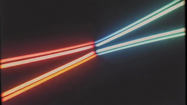 A striking abstract image showcases intersecting lines of vibrant red and cool blue neon lights against a dark, undefined background, creating a dynamic and visually captivating composition.