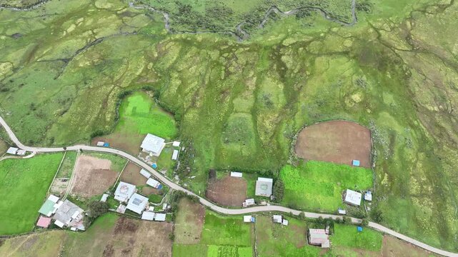 Aerial view of the lush green Phobjikha Valley, where the river meanders through the vibrant landscape, Wangdue Phodrang, Bhutan.