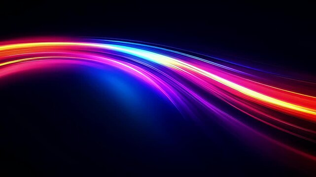 Vibrant multicolored light streaks on dark background.