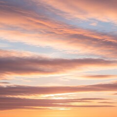 Fototapeta premium Vibrant Orange Sunset with Layered Clouds.