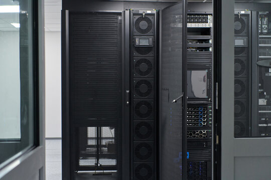 Modern data center with server racks and network equipment inside a secure IT room for enterprise infrastructure