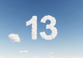 Cloud shaped number thirteen against blue sky background