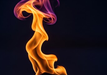 Obraz premium Vibrant and dynamic flame with orange and purple colors against a dark background