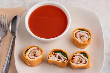 turkey pin wheel sandwich  with tomato soup