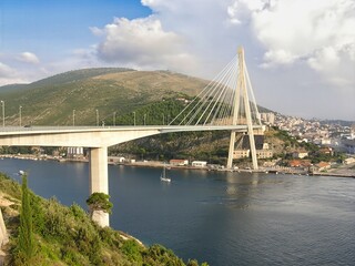 Fototapeta premium The Franjo Tudman Bridge is a cable-stayed bridge carrying the D8 state road at the western approach to Dubrovnik, Croatia across Rijeka Dubrovacka.
