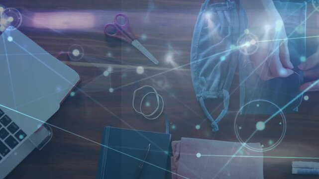 Animation of data processing over hands sewing and cloth equipment