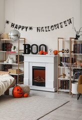 Naklejka premium Interior of living room decorated for Halloween with disco ball, fireplace and pumpkins