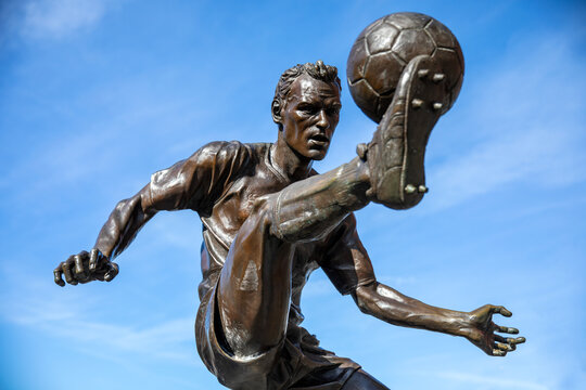 Dennis Bergkamp Statue at the Emirates Stadium in North London, UK