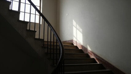 Elegant Curved Staircase with Black Metal Railing and Wooden Steps Bathed in Natural Light From Window, Interior Architecture Design Concept