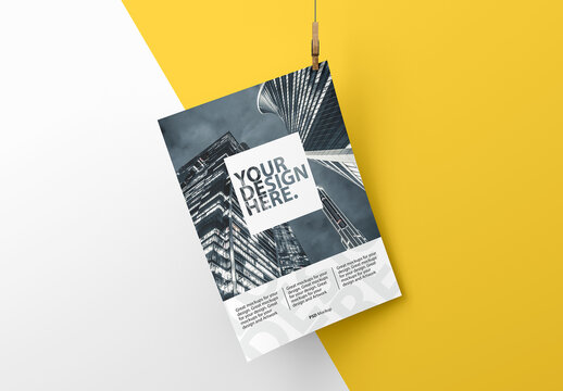 Sheet of Paper Mockup on a clothespin with a rope