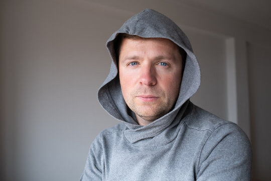  a distressed middle aged man feeling overwhelmed and stuck in a difficult situation