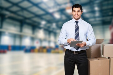 Portrait happy man at work in warehouse