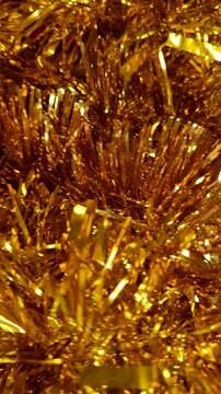 Sparkling metallic garlands and colorful ornaments displayed