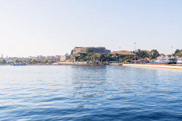 Fototapeta premium View of the New Fortress and city harbor in Corfu Greece.