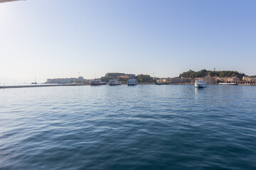 Fototapeta premium Authentic Corfu port view with ferries and Mediterranean architecture