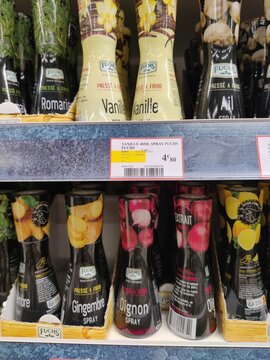 Saujon, France - January 24, 2026: Intermarche. Fuchs brand flavor sprays including vanilla, ginger, onion, and garlic displayed on a supermarket shelf with price tags visible