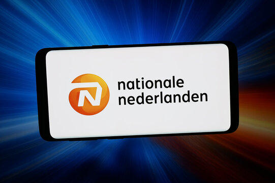 Stuttgart, Germany - 02-27-2026: In this photo illustration, the logo of company NN Group N.V. (Nationale-Nederlanden) is displayed on a smartphone in front of abstract background on computer screen.
