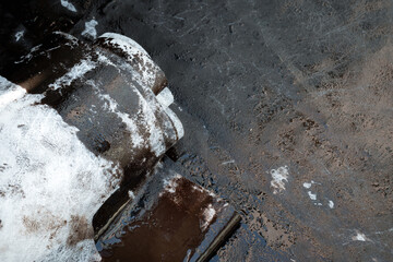 Fototapeta premium Waterproofing liquid membrane application with reinforcement mesh. Close up. Elastomeric liquid membrane applied on concrete floor of patio or balcony. Exterior leak repair. Selective focus.