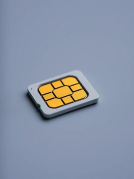 Close up of a micro SIM card lying on a plain surface, showcasing its intricate details,  technology,  close up