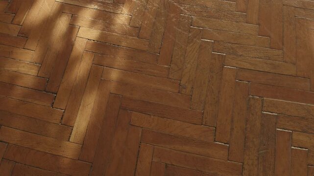 3D Animation of an old parquet floor with cracks covered by leaf-light patterns