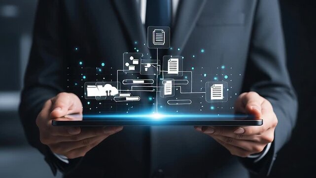 Businessman leveraging a tablet to visualize a dynamic network of digital files, symbolizing secure information management, cloud connectivity, and advanced technological solutions for data flow