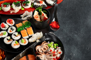 Various types of sushi including nigiri and rolls. Asian food concept. © bit24
