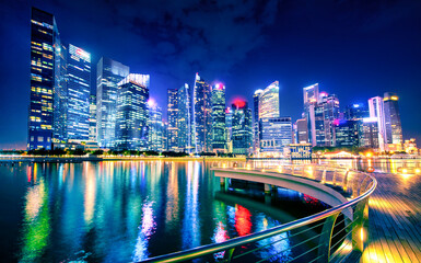 Singapore Skyline and view of skyscrapers on Marina Bay at twilight time.