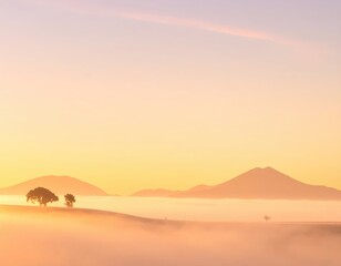 Serene Sunrise Over Misty Mountains and Silhouetted Trees